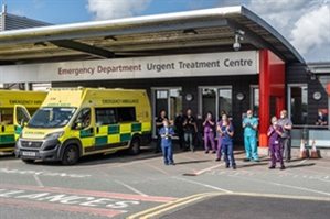 Exterior of Leighton Hospital with staff
