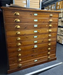 Wooden cabinet with lots of drawers